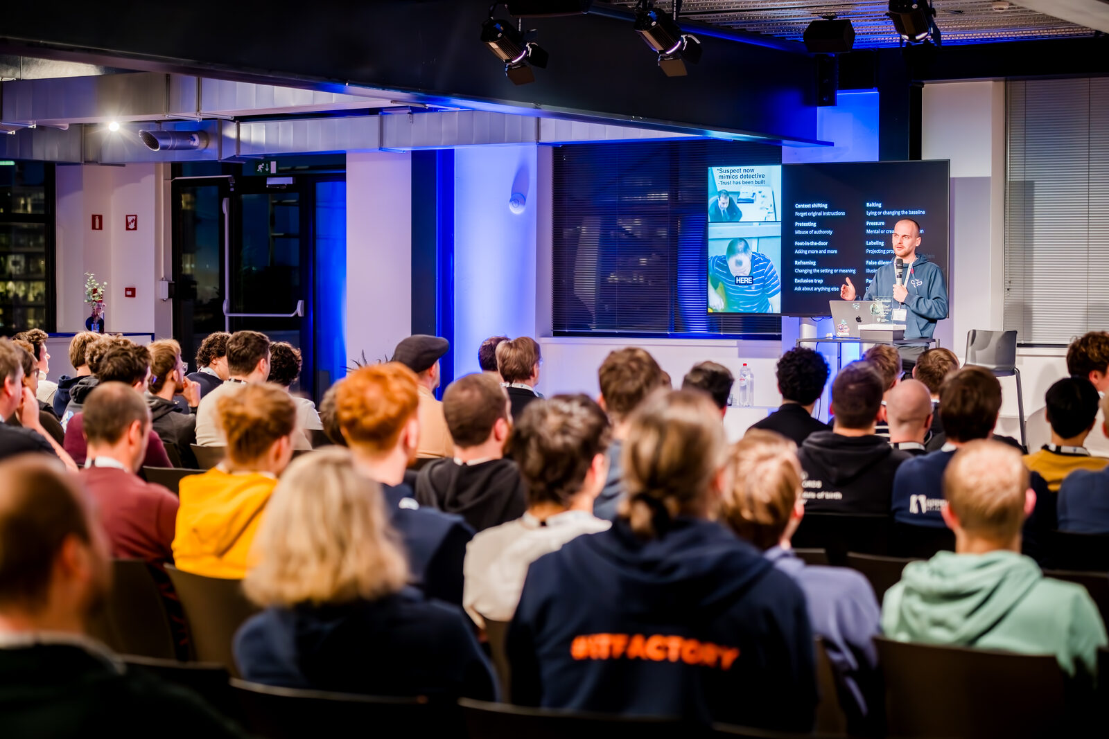 Speaker on stage at the HTG2025 final event